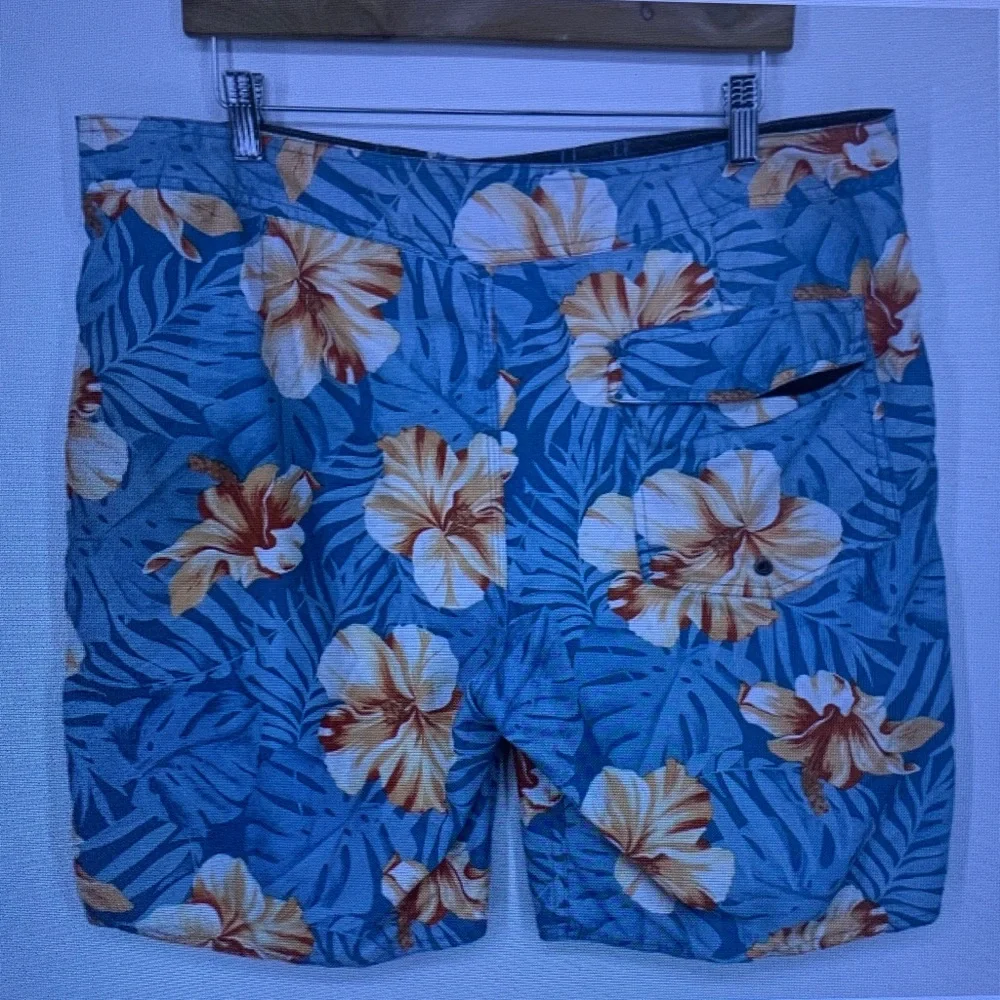 Quiksilver Men’s Blue Swim Shorts with Yellow Floral Print